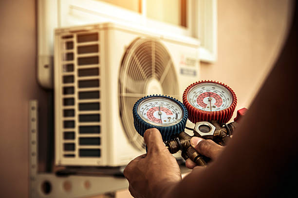 Professional Hvac technician working in Fairview, NJ